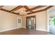 Spacious dining room with hardwood floors and chandelier at 903 W Franklin St, Monroe, NC 28112