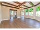 Dining room with hardwood floors, chandelier, and stained glass windows at 903 W Franklin St, Monroe, NC 28112