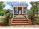 House exterior with brick pathway and ornate lion statues at 903 W Franklin St, Monroe, NC 28112