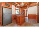 Modern kitchen with stainless steel appliances and wood cabinetry at 903 W Franklin St, Monroe, NC 28112