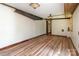 Spacious office with hardwood floors and exposed brick wall at 903 W Franklin St, Monroe, NC 28112