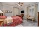 Neutral bedroom featuring hardwood floors, shutters, curtains, and a comfortable daybed at 3020 Poplar Hill Rd, Charlotte, NC 28270