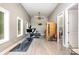 Bright exercise room with ample natural light, ceiling fan, and state-of-the-art fitness equipment and sauna at 3020 Poplar Hill Rd, Charlotte, NC 28270