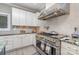 Gourmet kitchen featuring stainless steel appliances and stylish backsplash at 3020 Poplar Hill Rd, Charlotte, NC 28270