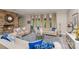 Elegant living room boasts a stone fireplace, plush seating, and bright natural light at 3020 Poplar Hill Rd, Charlotte, NC 28270
