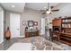 Spacious office featuring a custom bookcase, desk, and decor, ideal for a productive work environment at 3020 Poplar Hill Rd, Charlotte, NC 28270