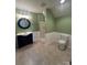 Bathroom with shower, toilet, vanity, and green walls at 4817 Mossy Cup Ln, Monroe, NC 28110