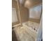 Bathroom with soaking tub and shower at 4817 Mossy Cup Ln, Monroe, NC 28110