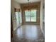 Breakfast nook with tile flooring and access to backyard at 4817 Mossy Cup Ln, Monroe, NC 28110