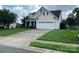 Two-story house with attached garage and well-maintained lawn at 4817 Mossy Cup Ln, Monroe, NC 28110