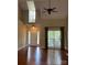 Bright living room with hardwood floors and high ceilings at 4817 Mossy Cup Ln, Monroe, NC 28110
