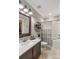 Bathroom featuring a large mirror, vanity, toilet, and shower with a tub at 127 Tradition Ln, Mooresville, NC 28115
