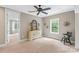 Spacious bedroom with neutral walls, ample natural light, ceiling fan, and decorative wall stars at 127 Tradition Ln, Mooresville, NC 28115