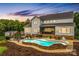 Beautiful backyard with a refreshing pool, lounge area, and meticulously landscaped grounds at 127 Tradition Ln, Mooresville, NC 28115