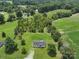 Sprawling acreage featuring a charming home surrounded by lush greenery and mature trees at 131 Sam Smith Rd, Kings Mountain, NC 28086