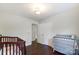 Bright bedroom with hardwood floors and ample closet space at 5601 Indian Brook Dr, Matthews, NC 28104