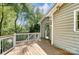 Deck with white railing and access to the backyard at 5601 Indian Brook Dr, Matthews, NC 28104