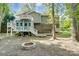 Two story house with deck and firepit at 5601 Indian Brook Dr, Matthews, NC 28104