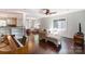 Open concept living area with hardwood floors and comfortable seating at 5601 Indian Brook Dr, Matthews, NC 28104