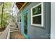 Charming studio with teal door and deck at 5601 Indian Brook Dr, Matthews, NC 28104