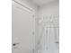 Bright closet with shelving, a hanging rod, and a door at 12119 Brooklyn Ave, Charlotte, NC 28204