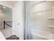 Bathroom with shower/tub combo and access to hallway at 8611 Frank Grier Rd # 1, Charlotte, NC 28215