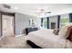 Main bedroom with large bed and ensuite bath at 8611 Frank Grier Rd # 1, Charlotte, NC 28215