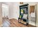Entryway with built-in bench, storage, and coat rack at 8611 Frank Grier Rd # 1, Charlotte, NC 28215