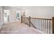 Upstairs hallway with access to bedrooms and bath at 8611 Frank Grier Rd # 1, Charlotte, NC 28215