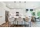 Modern kitchen with island and stainless steel appliances at 8611 Frank Grier Rd # 1, Charlotte, NC 28215