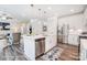 Open concept kitchen with island and living room view at 8611 Frank Grier Rd # 1, Charlotte, NC 28215