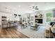 Open concept living room and kitchen with island and hardwood floors at 8611 Frank Grier Rd # 1, Charlotte, NC 28215