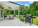 Covered patio with grill and ample space for entertaining at 8611 Frank Grier Rd # 1, Charlotte, NC 28215