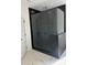 Modern bathroom features a glass walk-in shower, and sleek black fixtures for a contemporary design at 5225 Glenwalk Dr # 0061, Charlotte, NC 28269