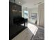 Bright bathroom features a glass walk-in shower, a soaking tub, white marble floors and a contemporary design at 5225 Glenwalk Dr # 0061, Charlotte, NC 28269