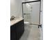 Modern bathroom features a glass walk-in shower, a modern vanity, and sleek fixtures for a contemporary design at 5225 Glenwalk Dr # 0061, Charlotte, NC 28269