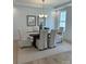 Bright dining room features neutral decor, modern lighting, a decorative table setting, and beautiful wood floors at 5225 Glenwalk Dr # 0061, Charlotte, NC 28269