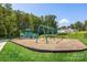 Community playground featuring swings and slide for active recreation at 5225 Glenwalk Dr # 0061, Charlotte, NC 28269