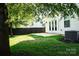 Private backyard with patio and wooden fence at 147 Fesperman Cir, Troutman, NC 28166