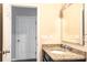 Bathroom with single vanity and granite countertop at 147 Fesperman Cir, Troutman, NC 28166