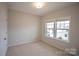 Bright bedroom with neutral walls and carpet at 147 Fesperman Cir, Troutman, NC 28166