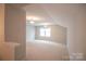 Spacious bonus room featuring neutral decor and carpet at 147 Fesperman Cir, Troutman, NC 28166