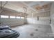 Unfinished garage with concrete floor at 147 Fesperman Cir, Troutman, NC 28166