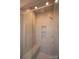 Luxurious shower with built-in seat and glass enclosure at 147 Fesperman Cir, Troutman, NC 28166