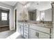 Double vanity bathroom with granite countertops at 822 N Rocky River Rd, Monroe, NC 28110