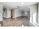 Spacious bonus room with hardwood floors and neutral walls at 822 N Rocky River Rd, Monroe, NC 28110