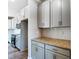 Kitchen boasts granite countertops and gray cabinets with ample storage at 822 N Rocky River Rd, Monroe, NC 28110