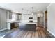 Modern kitchen with island and stainless steel appliances at 822 N Rocky River Rd, Monroe, NC 28110