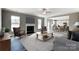 Open living room featuring a fireplace and built-in shelving at 822 N Rocky River Rd, Monroe, NC 28110