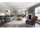 Spacious living room with hardwood floors and a cozy fireplace at 822 N Rocky River Rd, Monroe, NC 28110